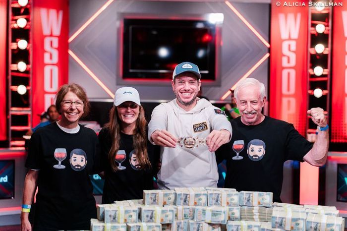 Daniel Weinman poses with his parents and girlfriend